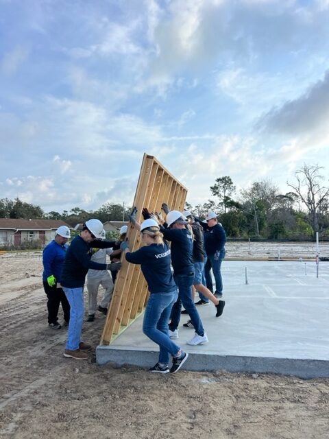 Seagate Development Group employees raised the wall on a new home in the McNeill Village neighborhood Habitats newest HOA neighborhood in North Fort Myers.