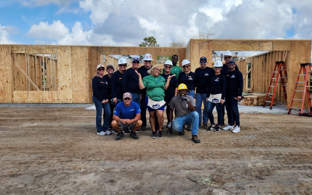 Seagate Development Group employees raise walls on Habitat for Humanity home