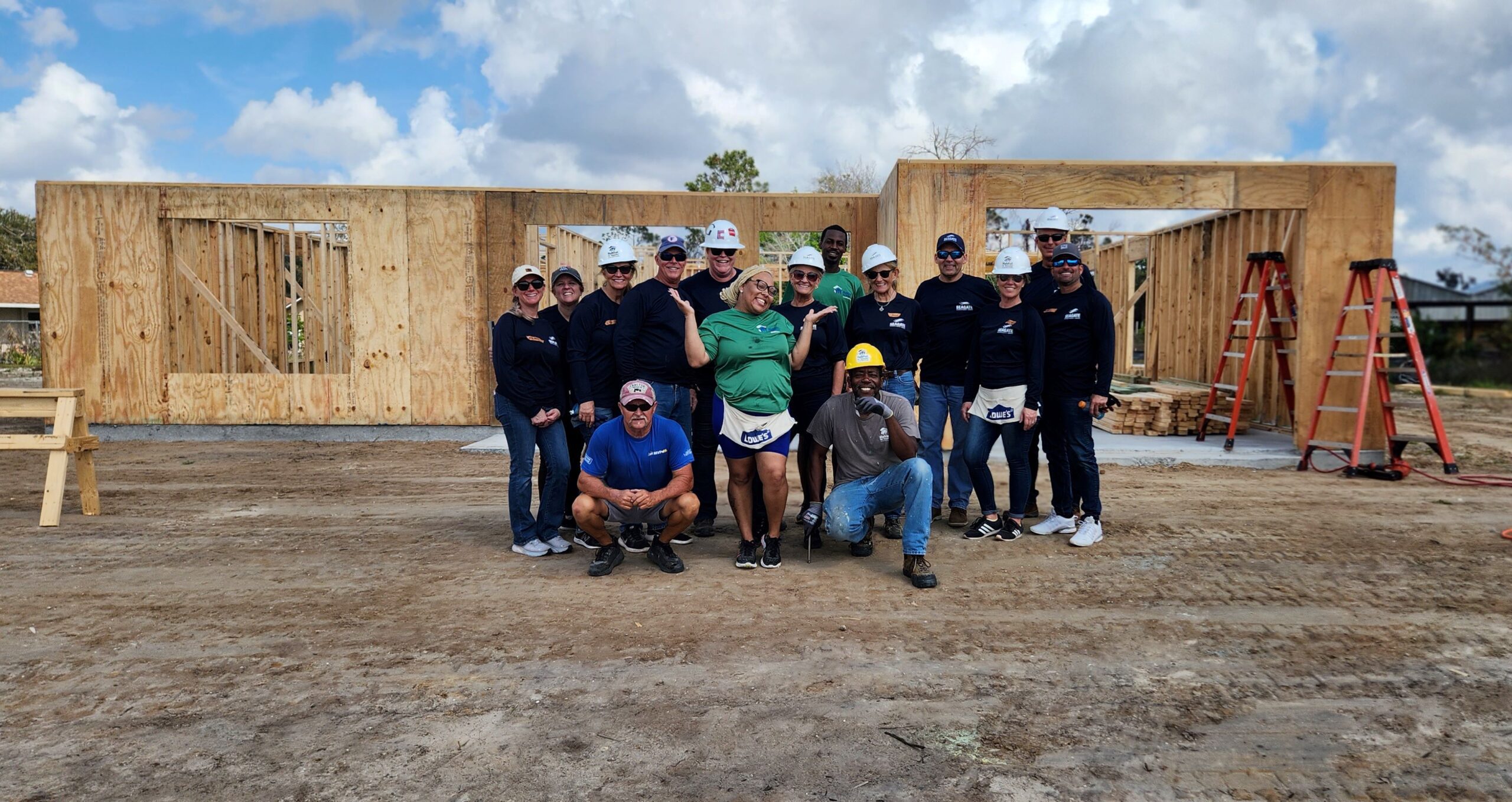 Seagate Development Group employees raise walls on Habitat for Humanity home